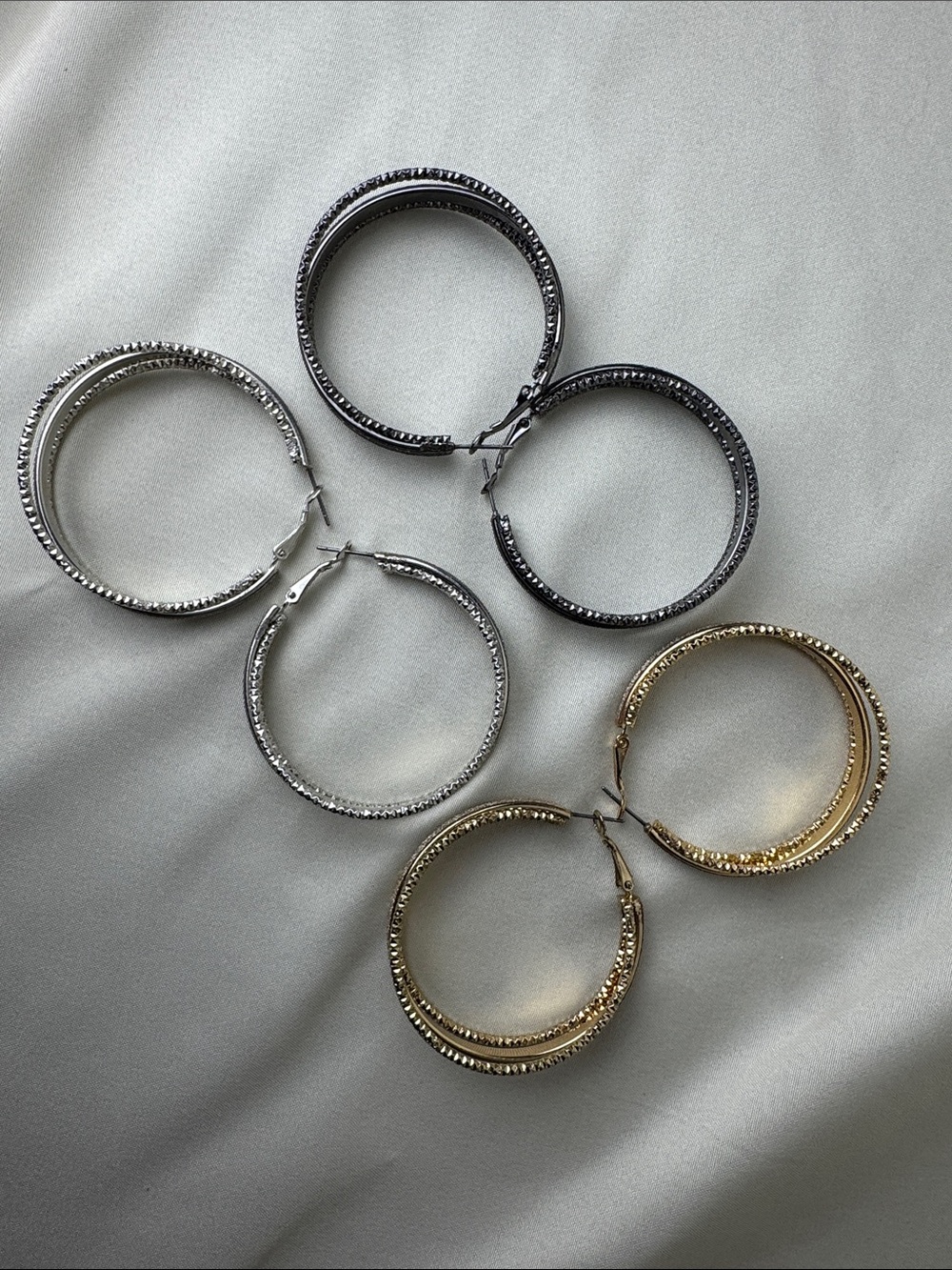Bundle of Sparkly Multi-Tone Hoop Earrings in Gold, Silver, and Black - Picture 8 of 8